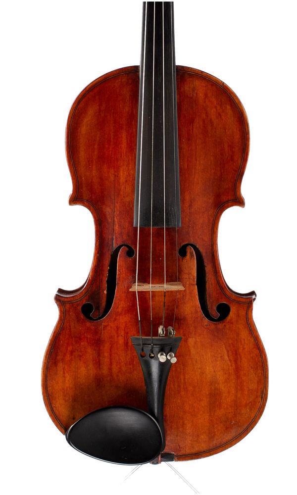 A violin, labelled M. Couturieux