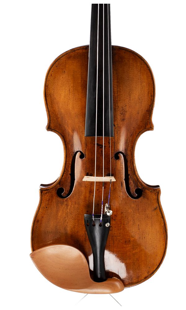 A violin, labelled Petrus Guarnerius