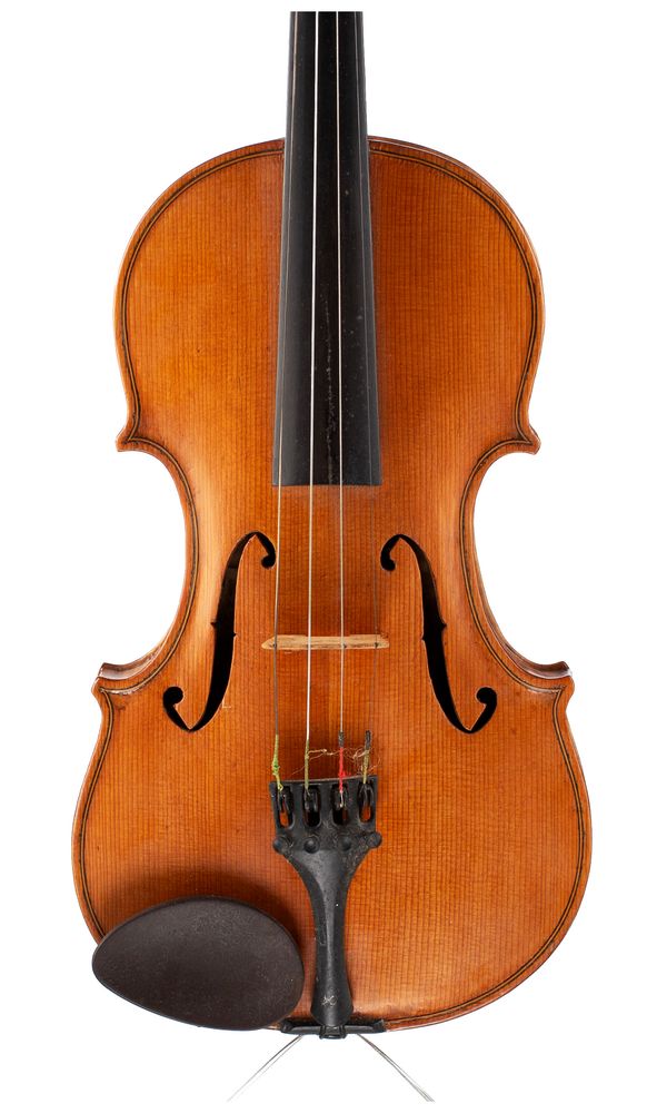 A violin, bearing a repairer's label
