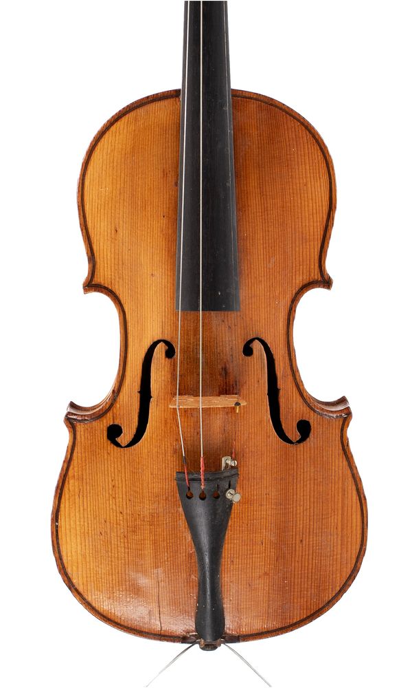 A violin, labelled Manufactured in Berlin, (L)