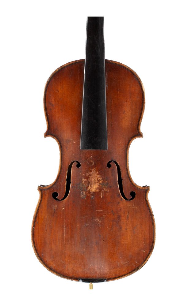 A small violin, labelled Copy of Stradivarius