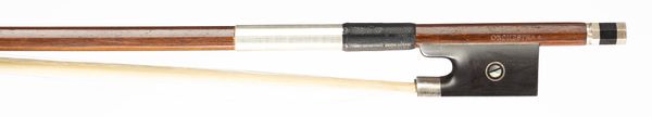 A nickel-mounted violin bow, branded Orchestra