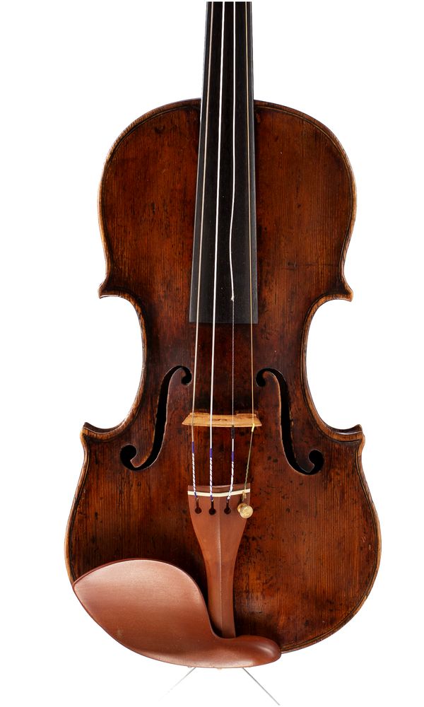 A violin, labelled Andreas Guarnerius