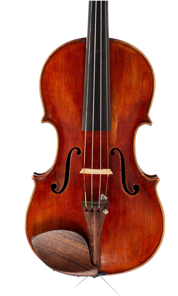 A violin, labelled Petrus Guarnerius