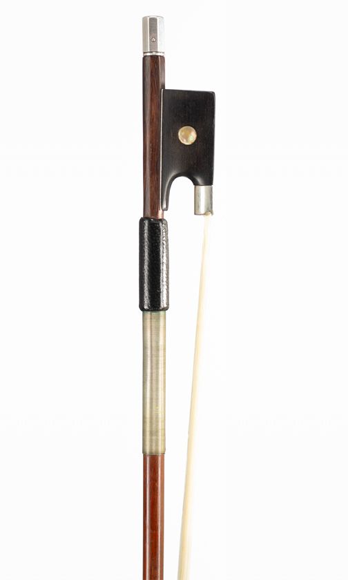 A silver-mounted violin bow, faintly branded Jas ...