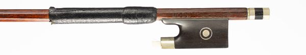 A nickel-mounted violin bow, branded Dodd