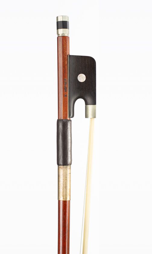A nickel-mounted cello bow, branded K. Hofner
