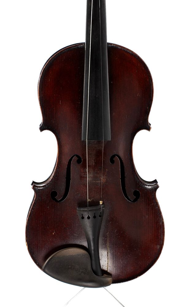 A violin, labelled Medio-Fino