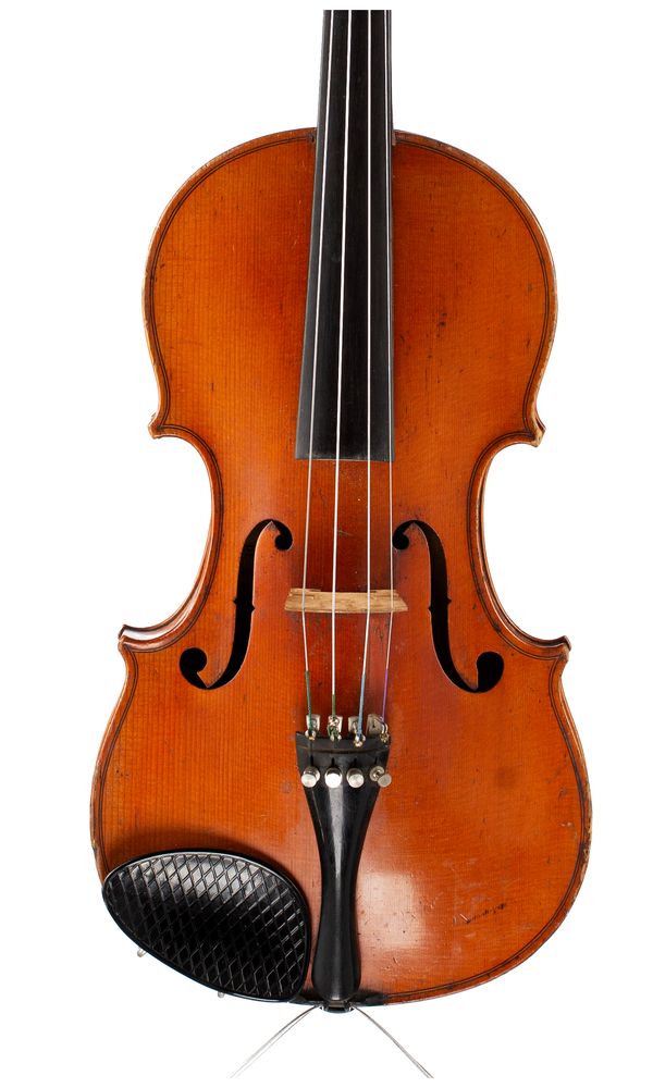 A violin, labelled Breton Brevette