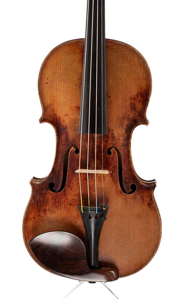 A violin, labelled Paul Mangenot  over 100 years old