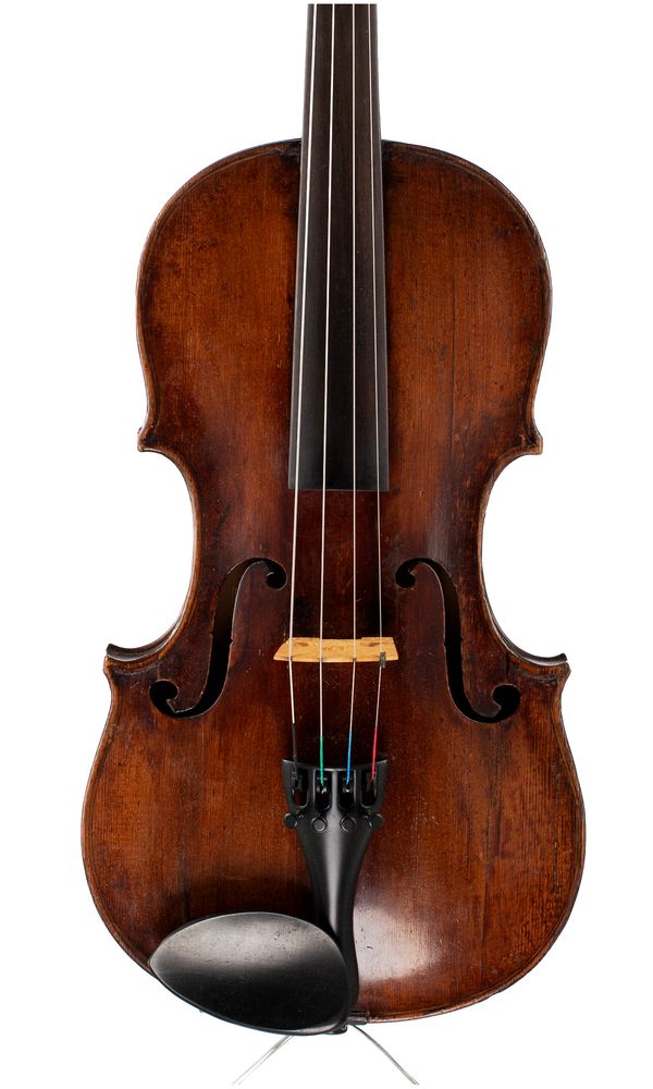 A violin, bearing a repairer's label