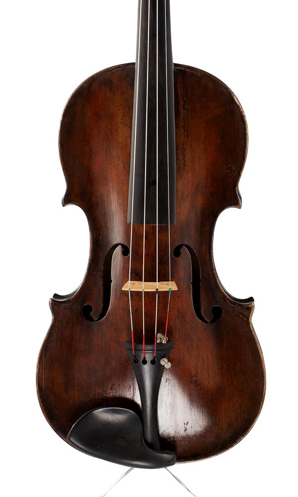 A violin, labelled Andreas Guarnerius Cremonensis