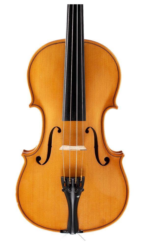 A violin, labelled Reghin