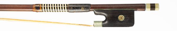 A nickel-mounted cello bow, branded Artist