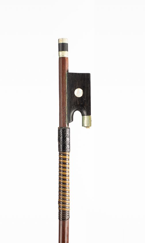 A nickel-mounted violin bow, branded Tourte