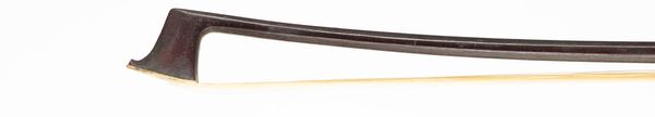 A nickel-mounted violin bow, branded Tourte