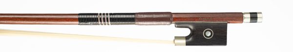 A child-sized nickel-mounted violin bow, branded Paesold
