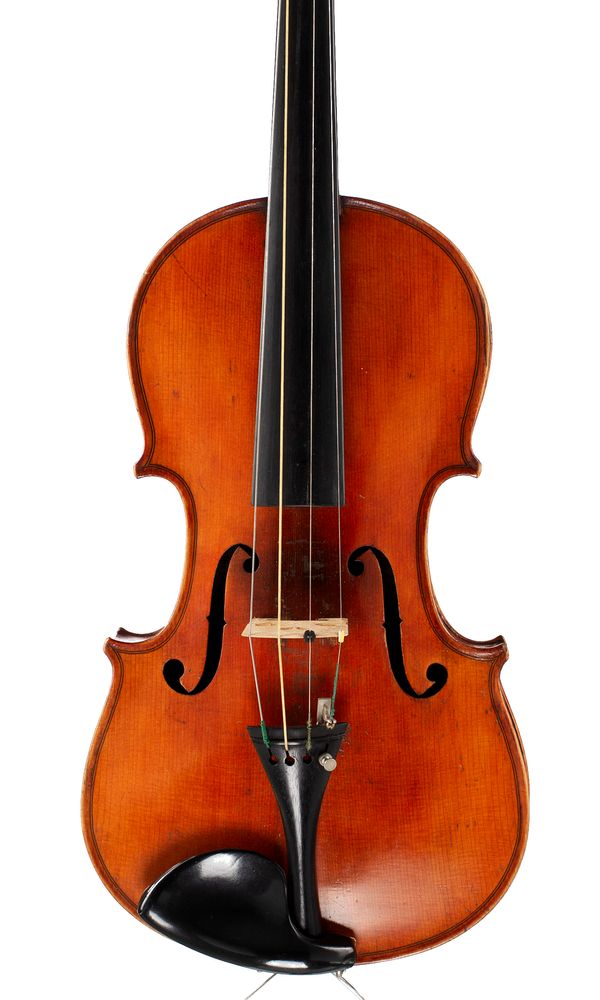 A violin, labelled Manufactured in Berlin (L)