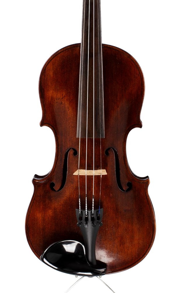 A violin, labelled Wilhelm Herm. Remini... Berlin
