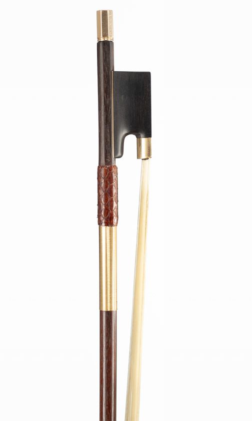 A gold-mounted violin bow, branded Jas Tubbs