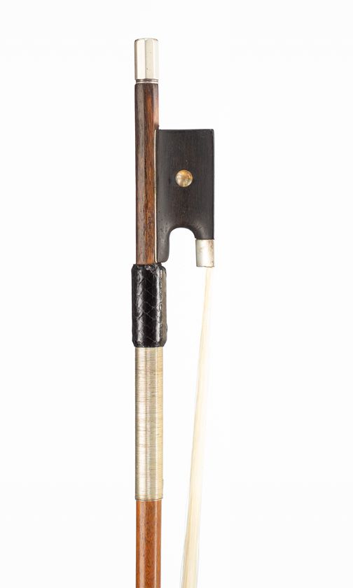A silver-mounted violin bow, branded Peccatte