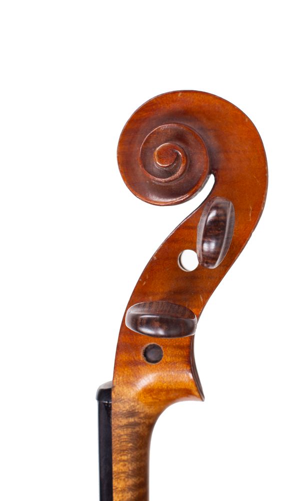 A violin, made for Hawkes & Son, France, circa 1910 - scroll