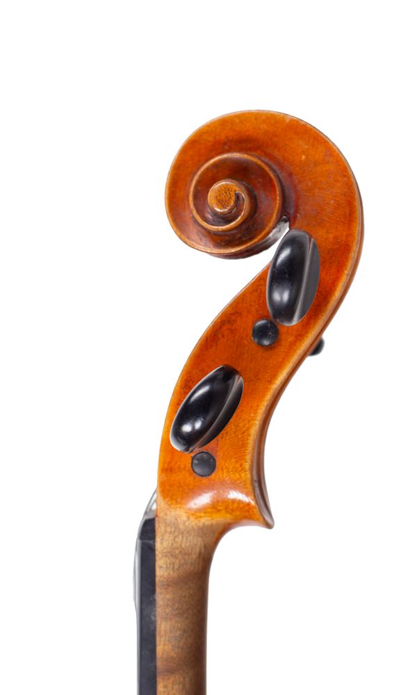 A violin, circa 1900 - scroll