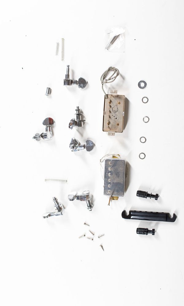 A bundle of assorted guitar parts