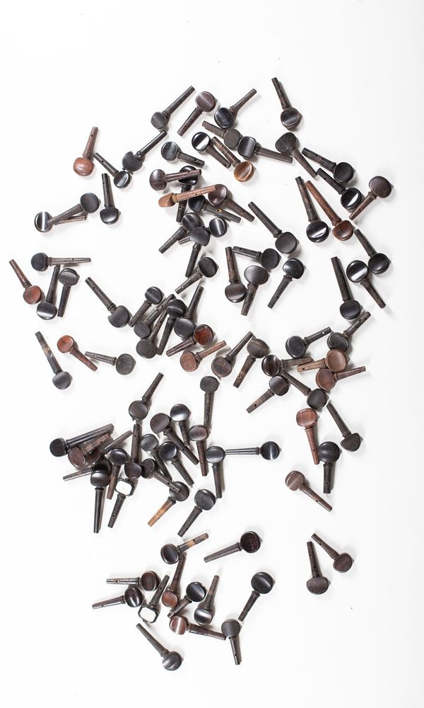 A bundle of one-hundred violin pegs, varying sizes