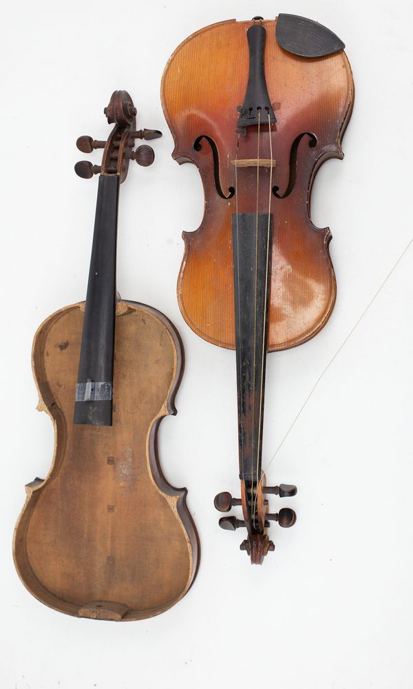 Three violins in need of repair