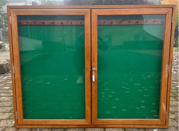 A bow display case with space for twelve bows, unbranded