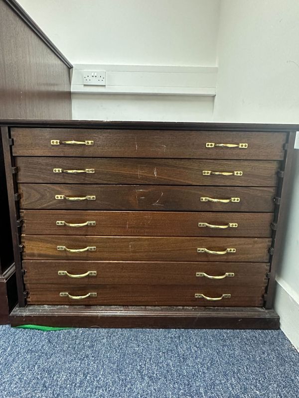 A bow cabinet with seven drawers for 41 violin/cello bows