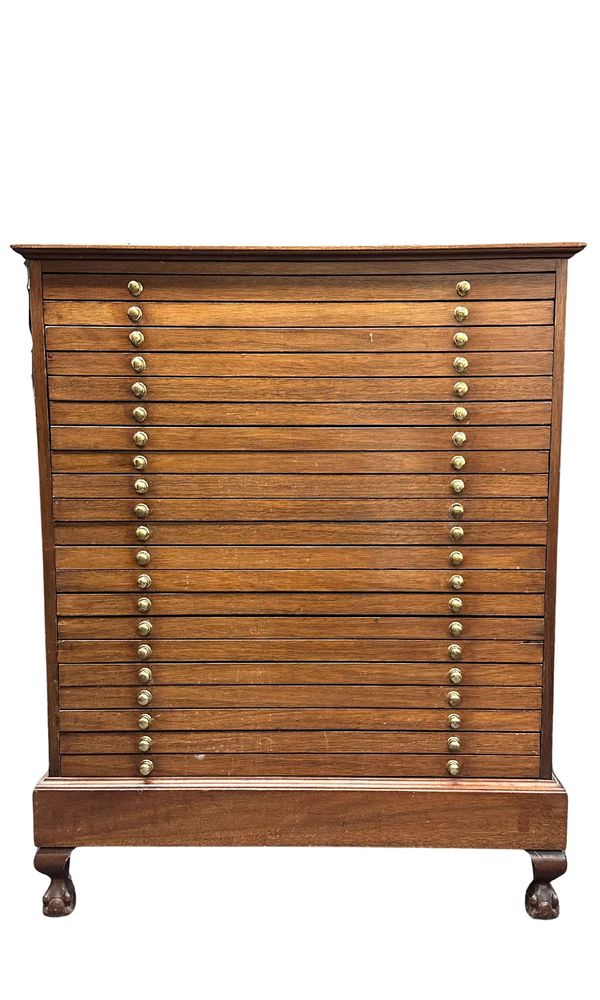 A bow cabinet with eleven Dragonetti-style bass bows drawers