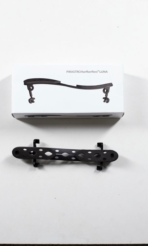 A shoulder rest, branded Luna