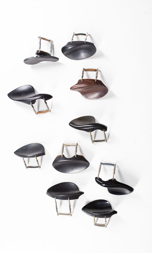 A bundle of ten chinrests, varying sizes