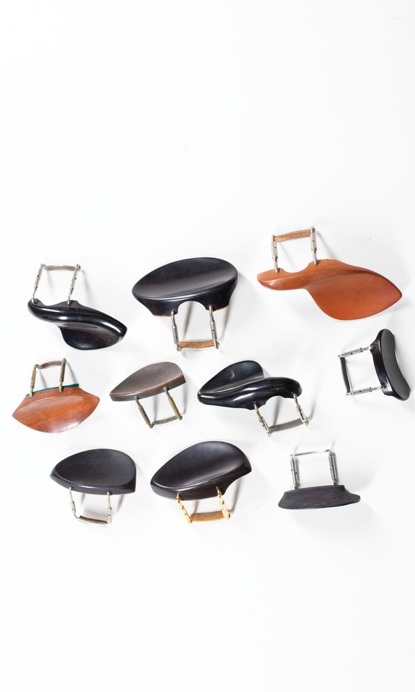 A bundle of ten chinrests, varying sizes