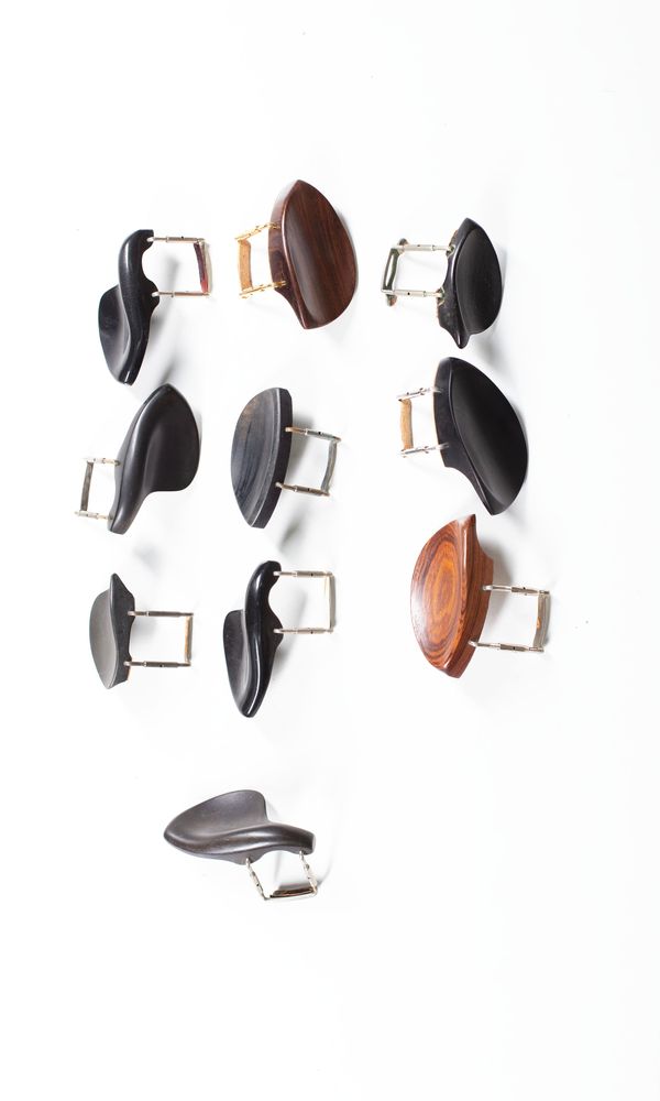 A bundle of ten chinrests, varying sizes