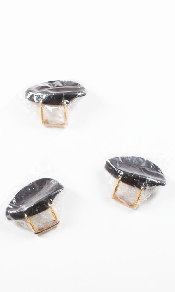 A bundle of three new chinrests, varying sizes