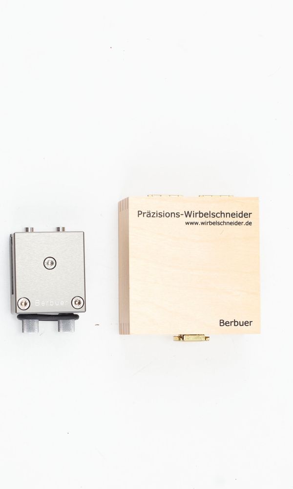 An adjustable peg shaver, branded Berbuer