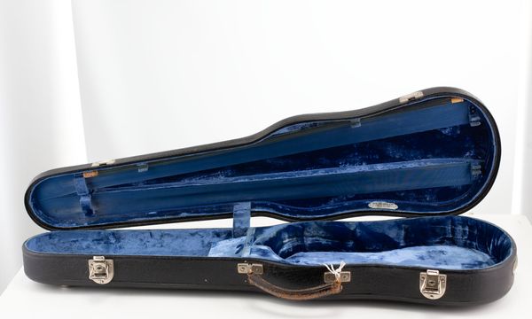 A violin case, branded J. & A. Beare