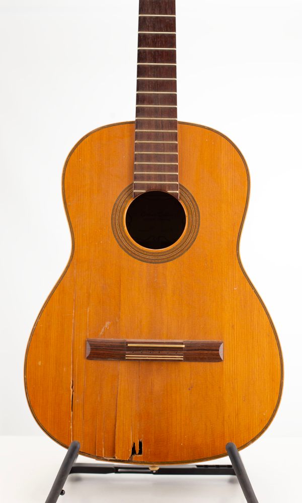 A classical guitar, labelled Oskar Teller