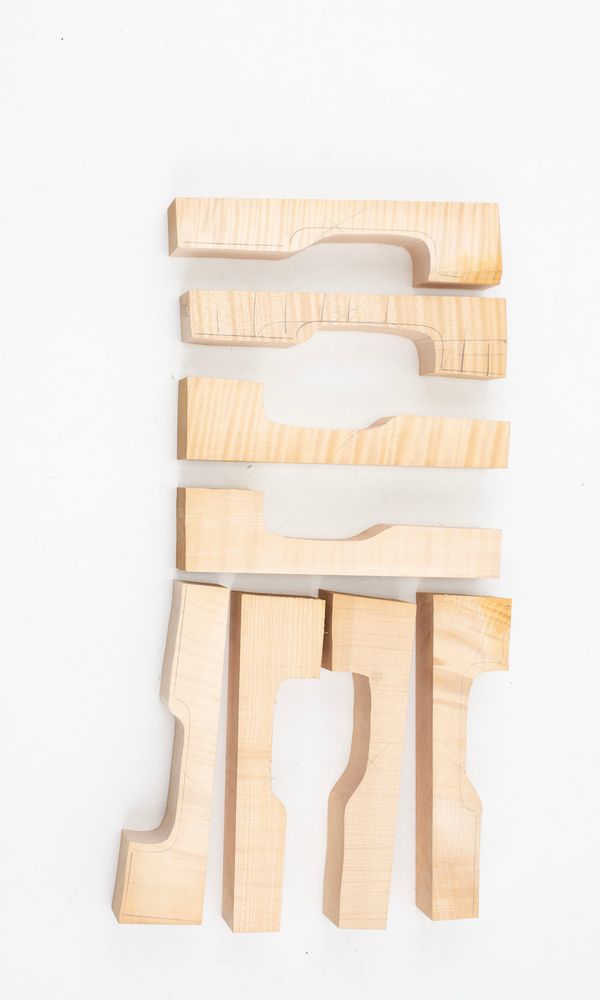 Eight violin neck graft blanks, maple (partially made)