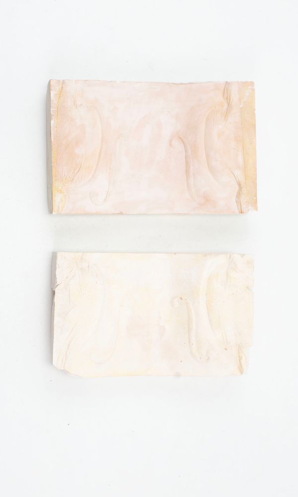 Two violin f-hole casts