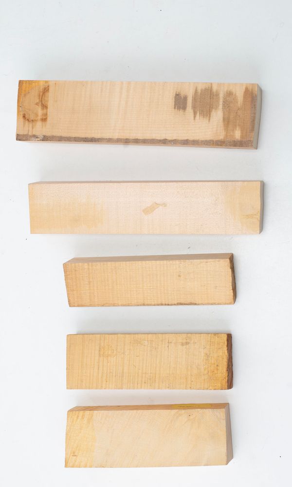 Two violin neck blanks and three neck graft blanks, maple