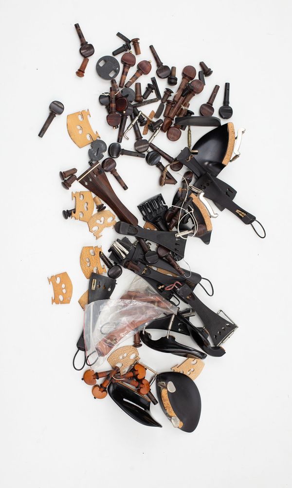 An assortment of violin accessories