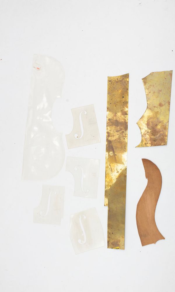 An assortment of violin template, some from the Hill Workshop