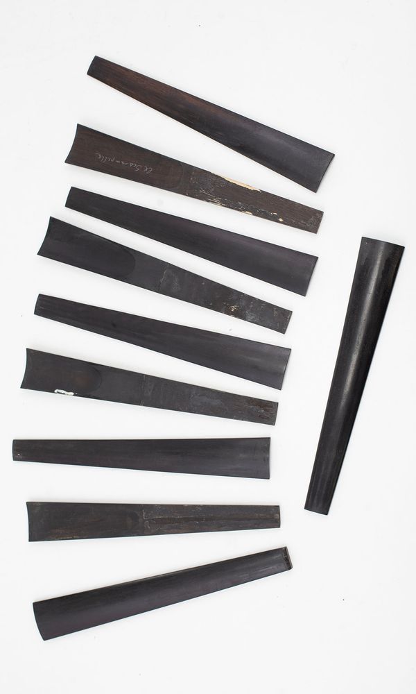 Ten violin fingerboards, ebony (used)