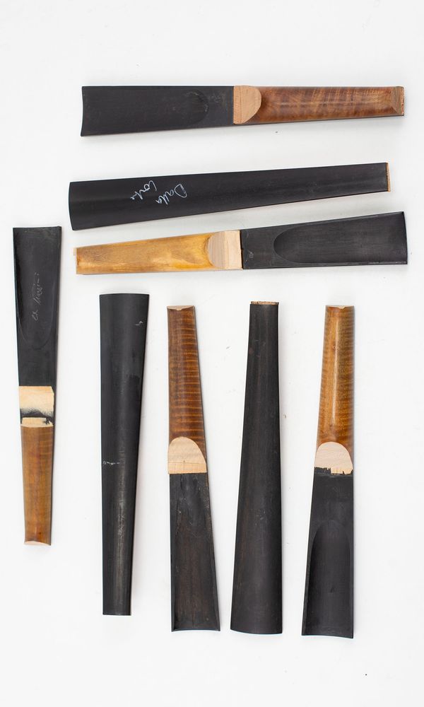 Eight violin fingerboards, ebony (used)