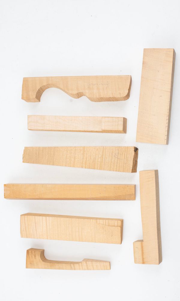 Eight violin neck graft blanks, maple (partially made)