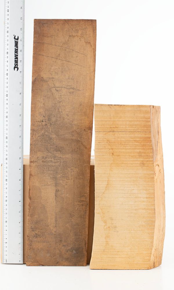 Four pieces of wood, varying sizes